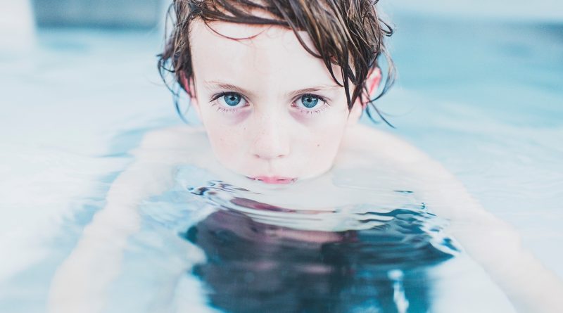 tween boy floating in water; identity formation and gifted children
